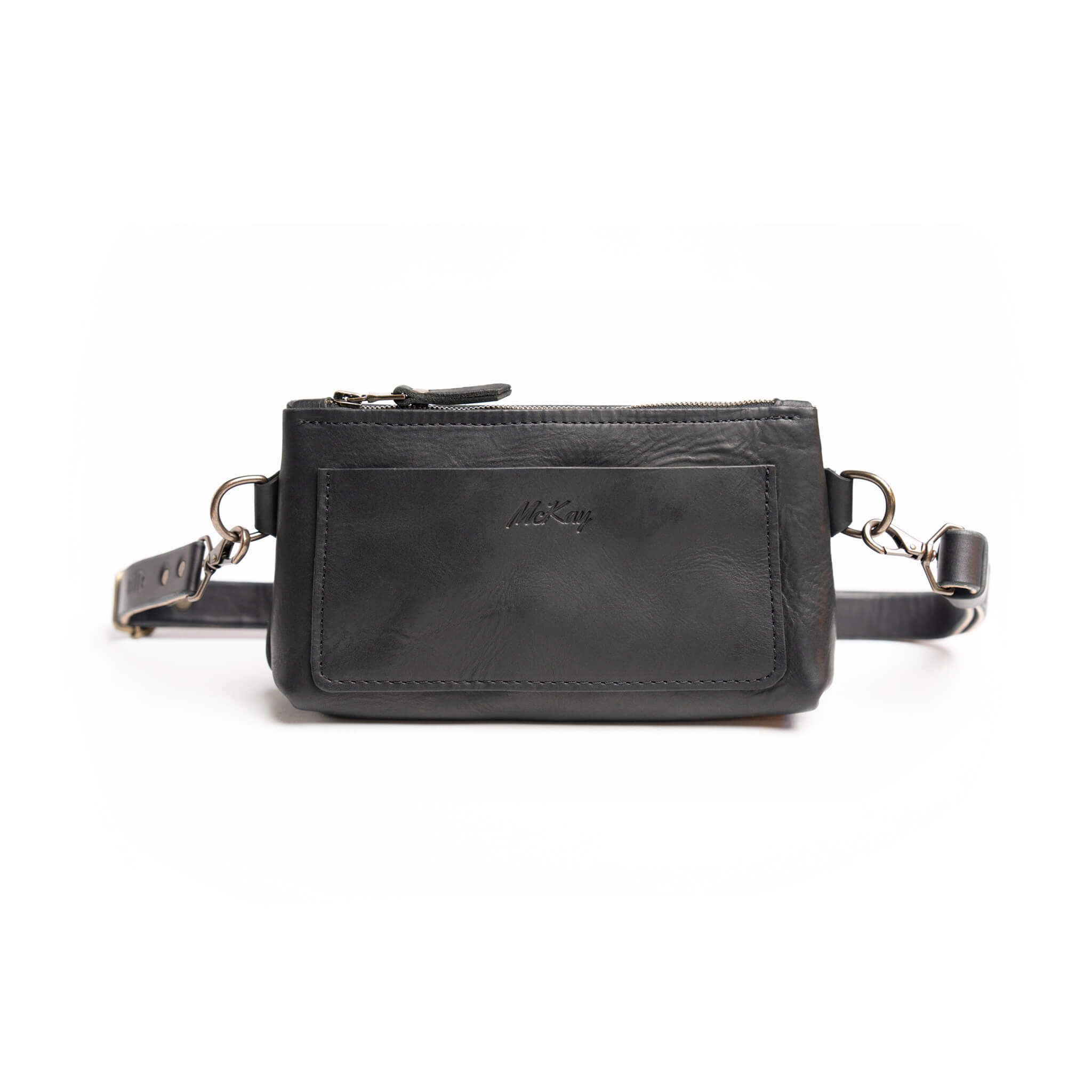 Onyx black full-grain Horween leather crossbody waist bag with front pocket and solid brass hardware