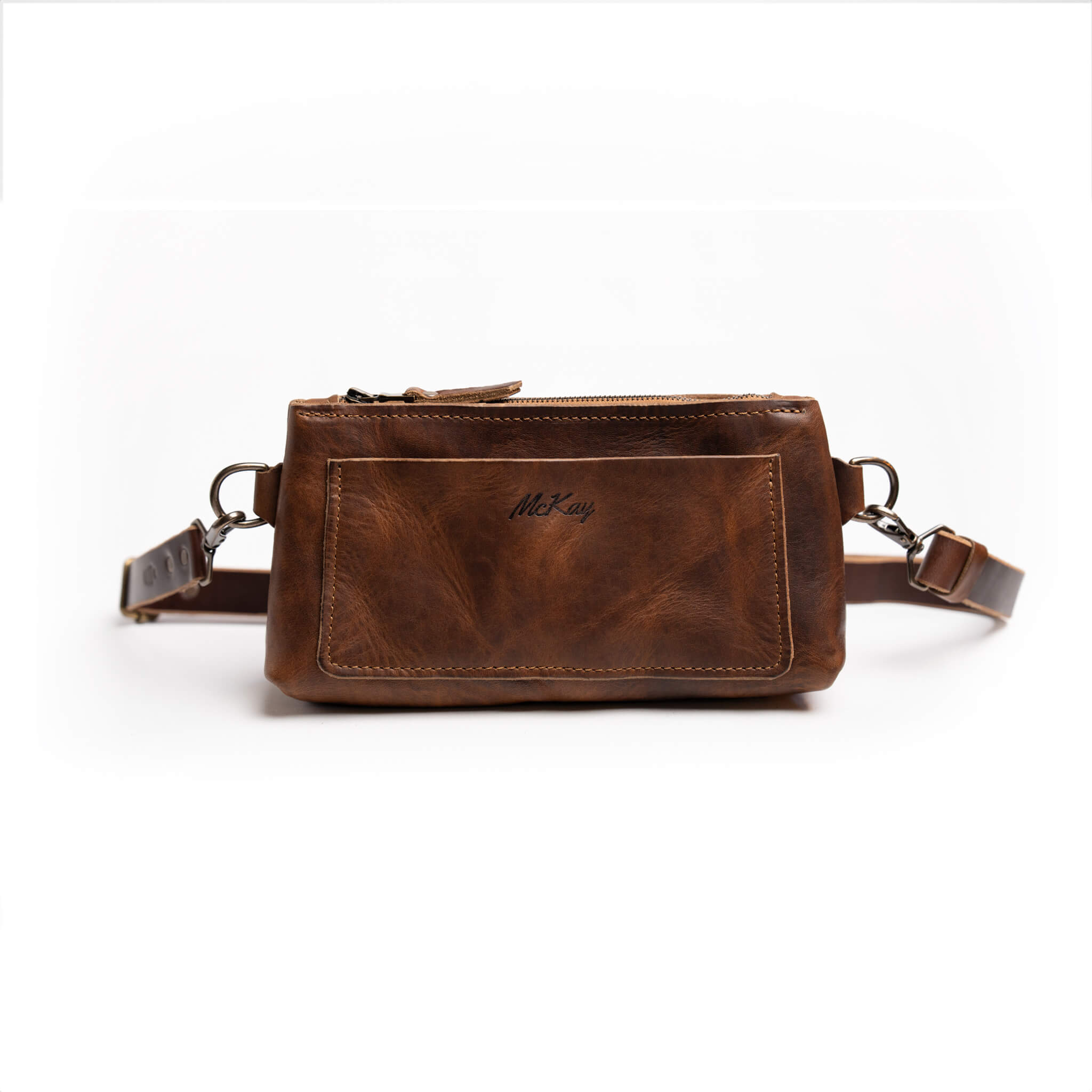 Sable dark brown Horween leather crossbody belt bag with structured silhouette and USA-made brass zipper