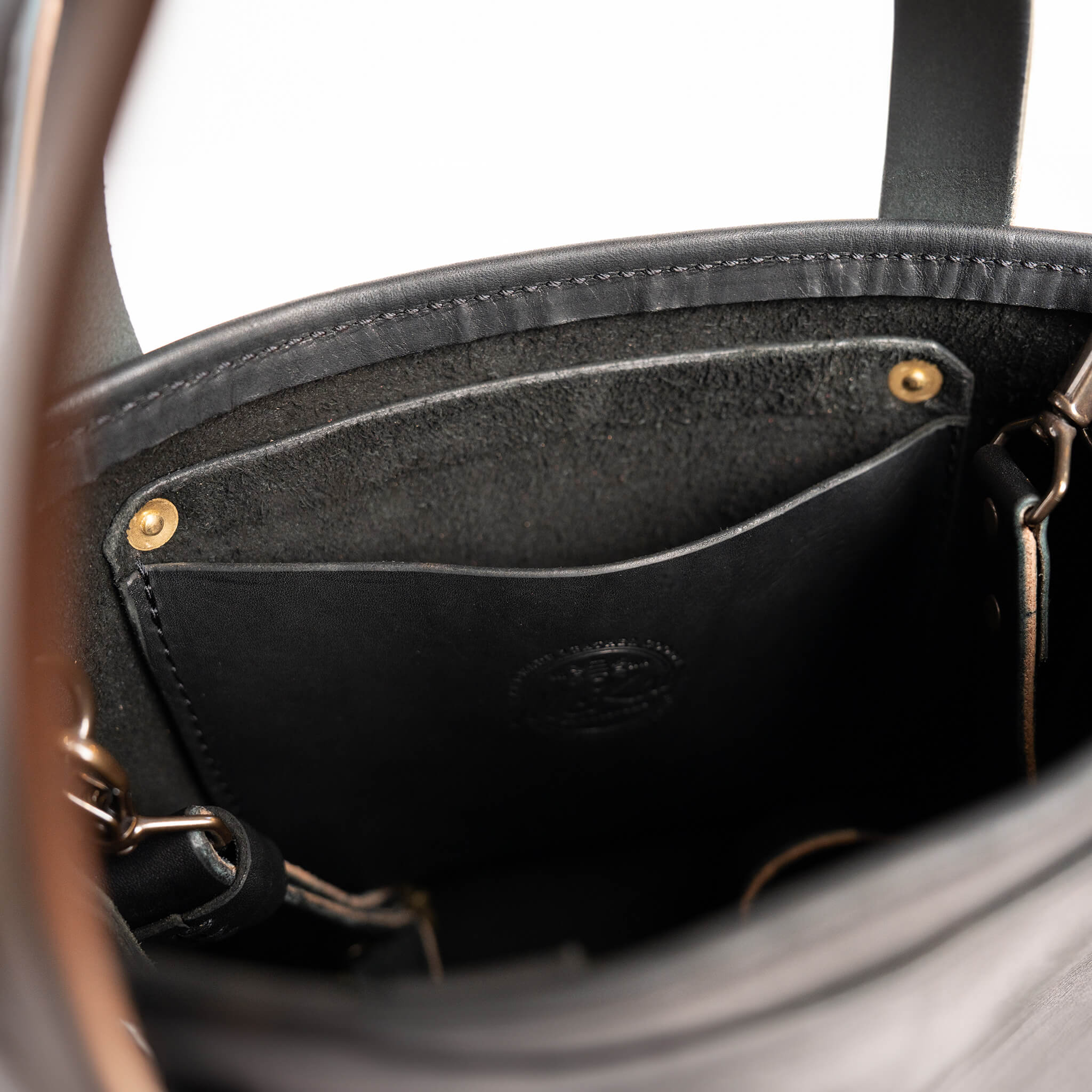 McKay mini tote Onyx black interior pocket full grain leather handbag